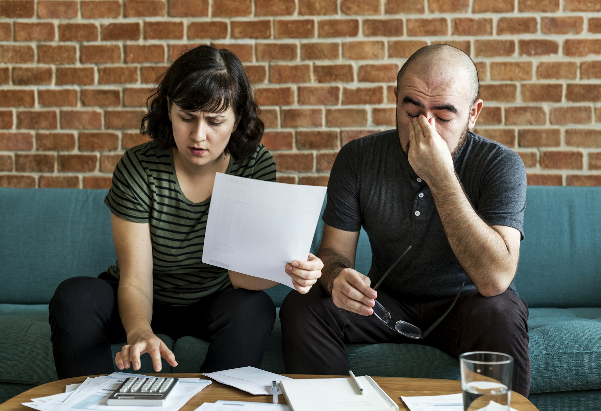 Couple managing the debt